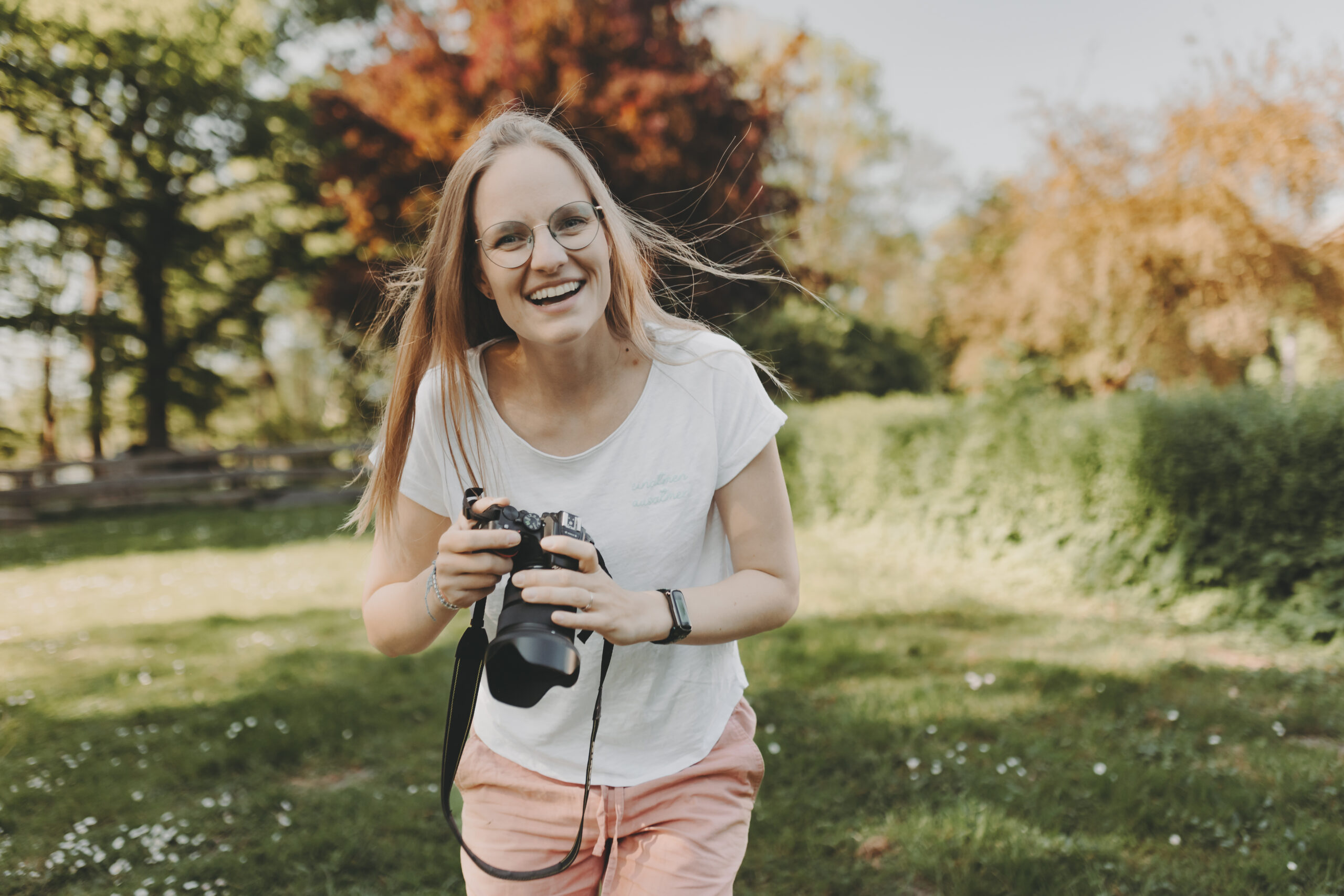 Fotografin mit Kamera